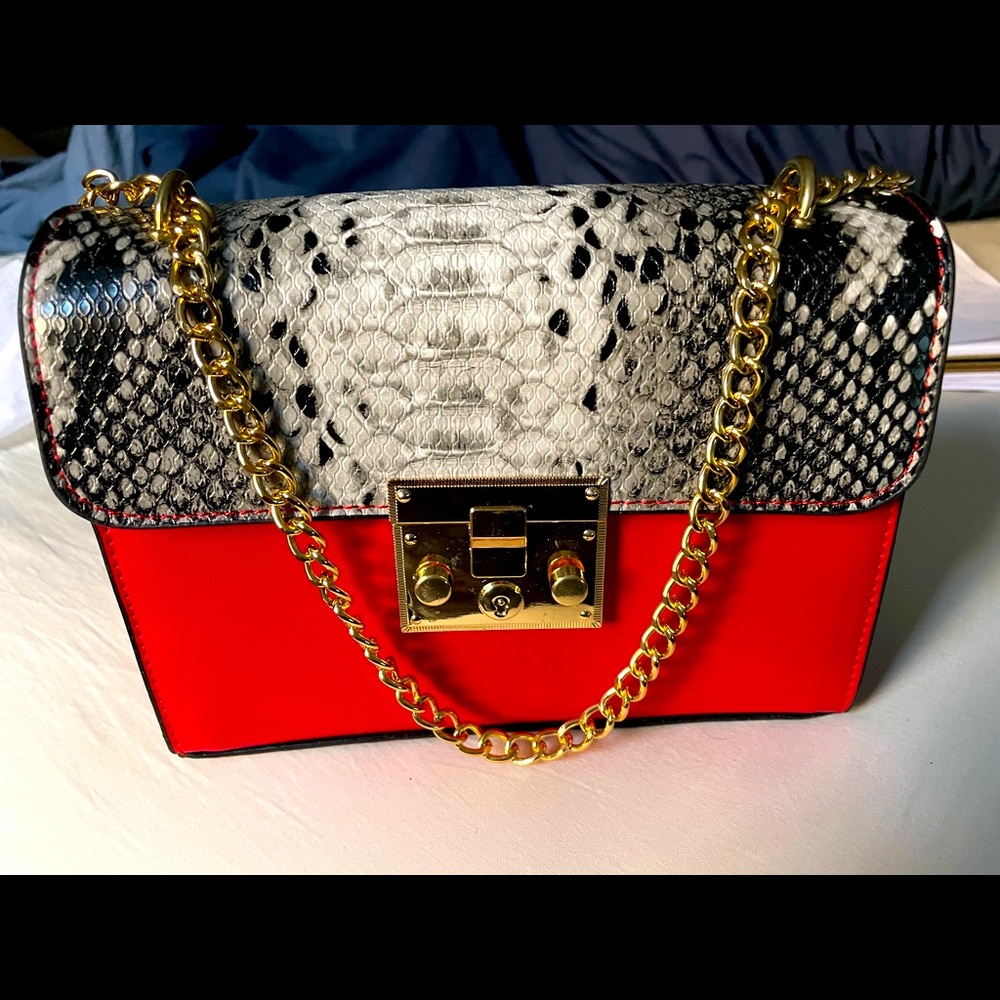 Brand new red and snakeskin print purse